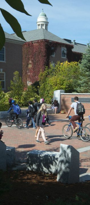 Students biking on campus.