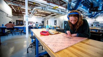 Students work on their projects in the UMaine Printmaking Studio, located in the Wyeth Family Studio Art Center