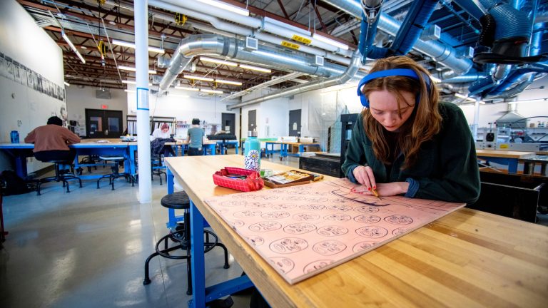 Students work on their projects in the UMaine Printmaking Studio, located in the Wyeth Family Studio Art Center